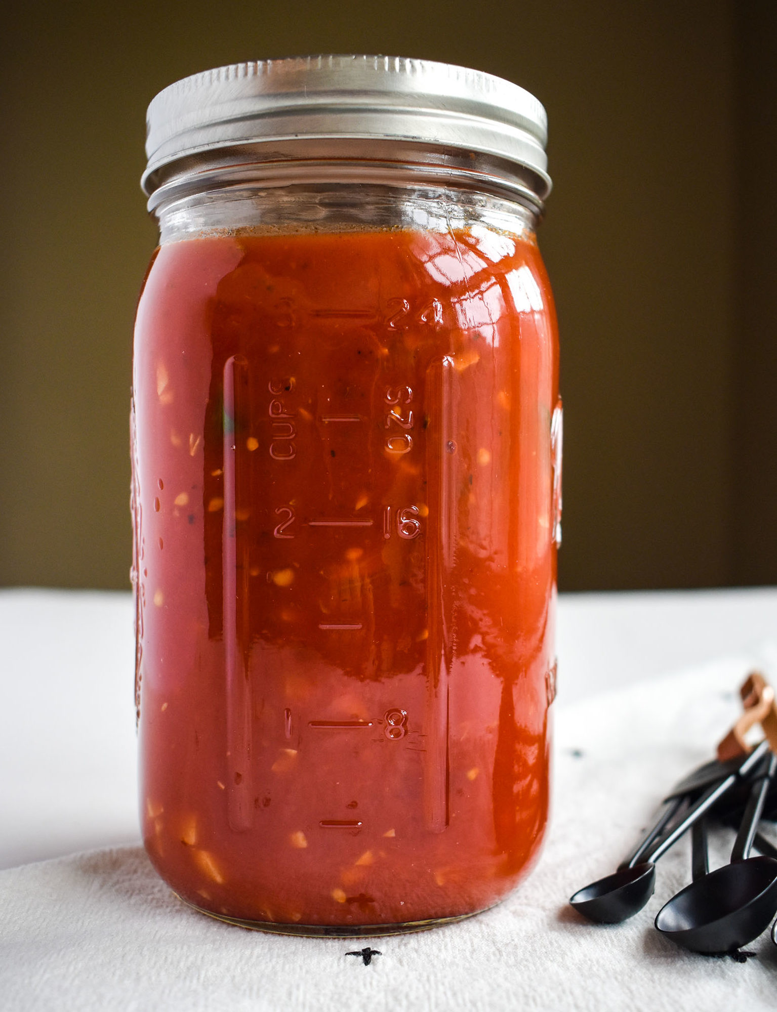 Homemade tomato sauce in a jar- 3 summer ingredients and 3 meals.